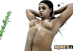 Large butt black trans craves to relax after a busy day. This babe took a double-sided sex toy and begin sucking on it during the time that jerking of