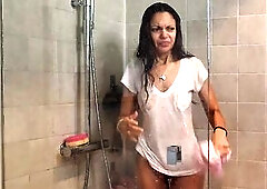 Watch this gal get a real surprise when the water is turned on and that babe gets all moist. Luckily this babe can get nude and proceed to clean. Cert