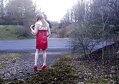 Nasty transsexual Gina masturbating by the road with passing traffic