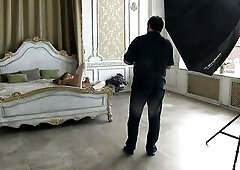 Nice-looking and glamorous pornstar Katya Clover positions and disrobes sensually for Henry Sharpe (Antonio Clemens) for a photo session (behind the s