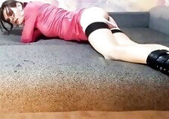 Crossdresser plays with a sex-toy and a booty-plug