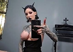 Inked goddess flaunts her big tits and makes herself cum