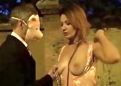 Masked freak bring her BDSM slave in public for humiliation