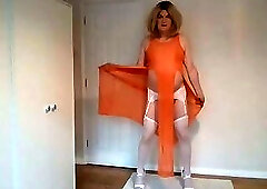 Orange dress with white stockings and heels