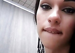 Dark-haired transsexual plays with his huge penis with great joy