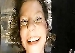 The brunette hair lies on the plastic sheet getting her face and open throat blasted by multiple schlongs, cum running down her cheeks and tongue. The