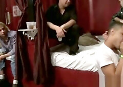 Stripper rubs his cock in a guys face