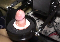Exploring the automatic masturbator again and wailing vigorously from the rock hard movements!