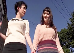 Two busty babes pleasure each other's hairy pussies with toys in the tub