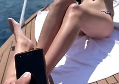 Big-Titted Brunette Vibes to Orgasm on a Yacht