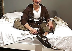 Naughty stud with a foot fetish sucks his toes passionately