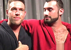 Spandex BDSM stud gets handjob from dom hunk