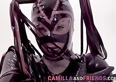 Shemale in tight latex bondage outfit