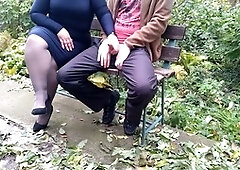Hot curvy mother-in-law gives me a handjob in a public park