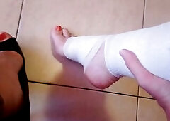 Foot & ankle fetish bandage with red nail polish