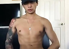 Thai Miiaca jerks his cock