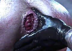 Inked hunk fisted after anal doggystyle