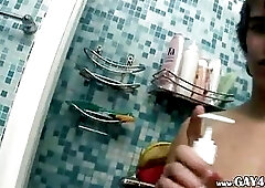 Jerome using huge butt plug in a shower