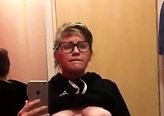 Nerdy teen with big natural boobs brings herself to climax