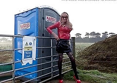 CD Gina outdoors pissing stroking posing in pvc