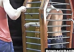 BDSM fun with caged dude tormented with hot wax and harsh nipple clamps