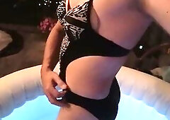 Tgirl geting soaked in hot one piece swimsuit