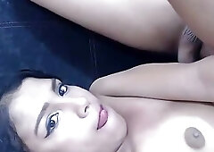 Cute and flexible brunette shemale sucks her own hard cock