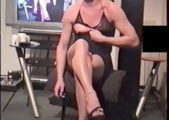 Sexy crossdresser TCSBrenda flaunts high heels and smooth legs in a seductive display