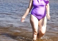 Hawt woman in soaked swimsuit