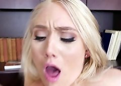 A blonde with a sexy and firm behind is sitting on a big hard dick