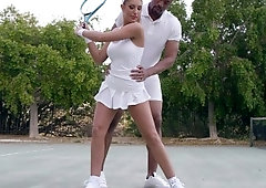 Busty August Ames flirting with her tennis couch