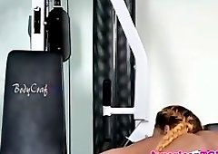 Busty ebony tgirl jerking dick at the gym