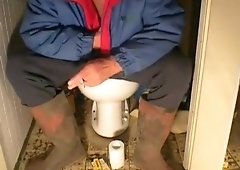 nlboots - reading a book on water closet