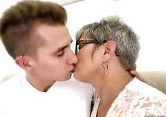 Grandma deepthroats a youthful large dong previous to riding on it