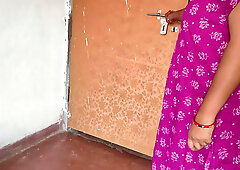 Young Indian housewife in a silk sari surrenders to the exotic delivery boy during a late afternoon package drop in her empty apartment