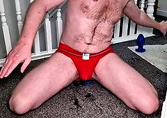 Playing around on the stairs in red undies and socks