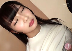 Stylish Japanese woman shares intimate moments in soft lighting