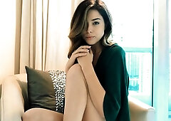 Seductive young babe in black panties poses for the camera