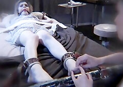 Lewd nurse Cherie DeVille relishes each opportunity to anguish her captive patients, particularly TS sex serf Ella Hollywood. Ella is thonged to a cou