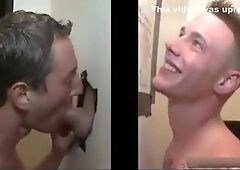 Horny dude gets his boner sucked through hole in the wall