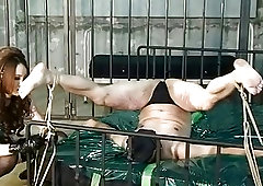 Tantalizing mistress enjoys BDSM and femdom playing with her slave