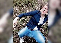 Clothed up in jeans and high top converse sneakers. Playing with my sex tool in the woods