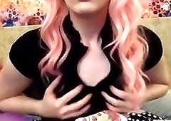 Pink-haired tranny on live cam masturbates