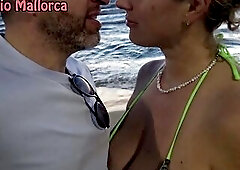 Capturing the nice-looking sunset on Mallorca's shore, I was surprised by a breathtaking, curvaceous German woman who stumbled into my discharged