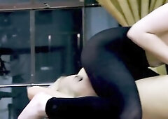 3 skinny brunettes disrobe down on a lengthy table between the easels, one stretched out flat in white nylons whilst the others kneel over her in ebon