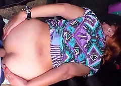 Mature nymph is having a stream while getting torn up in the camper, from the back