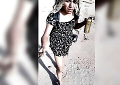 Ladyboy with cute sexy feet in mini suit and heels walks in very sexy