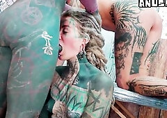 In the tattoo studio, 2 heavily inked punk goddesses get things started hawt and enormous: dreadlocks tattoo artist Anuskatzz and her client Edone dis