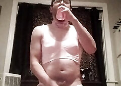 Sissy Sucks Sextoy in Pink Pants and Brassiere