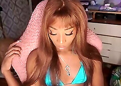 ebony trans girl Vanniall edges for two hours in a tiny blue bikini - ending in self facial!
